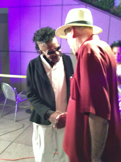 Sly_Stone_greets_Michael_Alexander